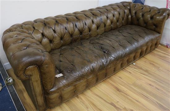 A large Chesterfield olive leather sofa, W.240cm